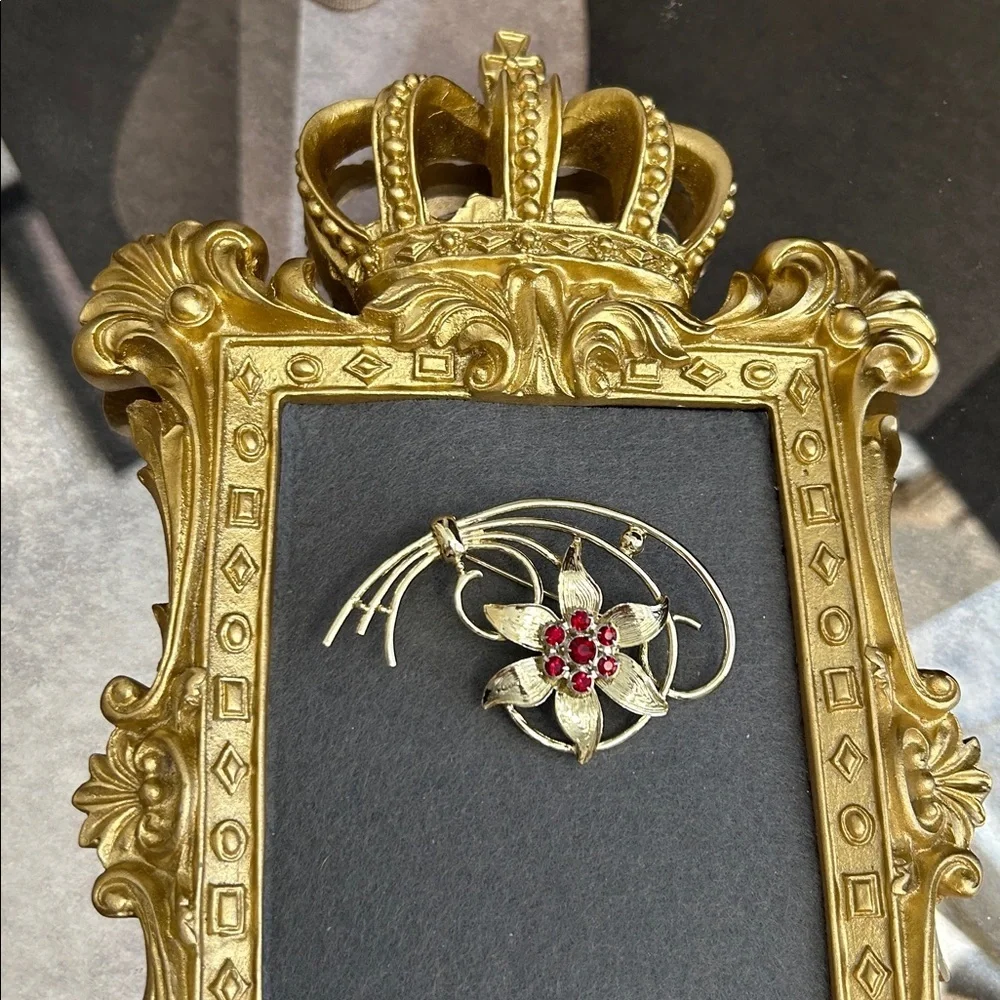 Gold-Tone Floral Brooch with Red Crystal Accents